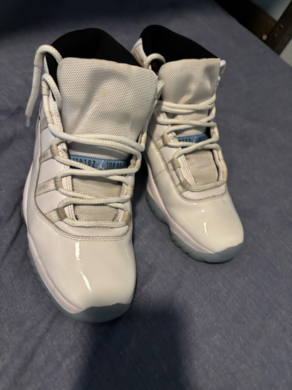Jordan White and Blue High-Top Sneakers with Light Blue Accents